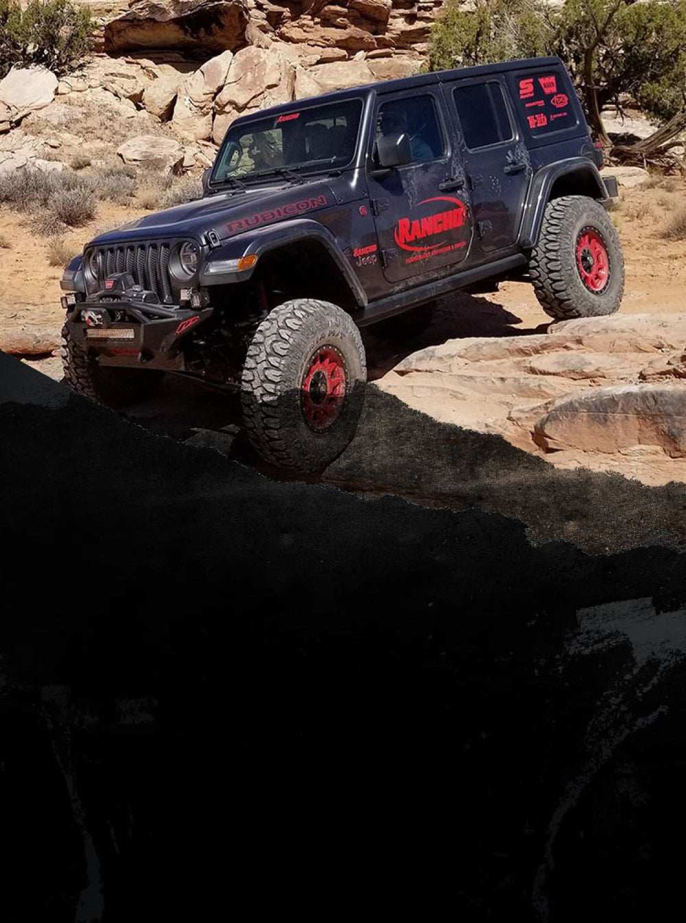 Rancho jeep driving on rocks